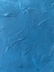 Textured deep blue panel rich color and intricate surface patterns background