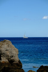 sailboat the horizon of the sea