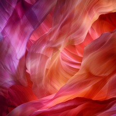 Fototapeta premium Vibrant hues of red, orange, and purple blend together as sunlight illuminates the smooth curves of sandstone in Antelope Canyon, creating a breathtaking natural spectacle