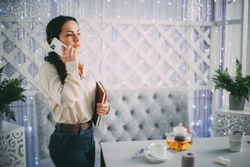 Business Call with Notebook in Hand