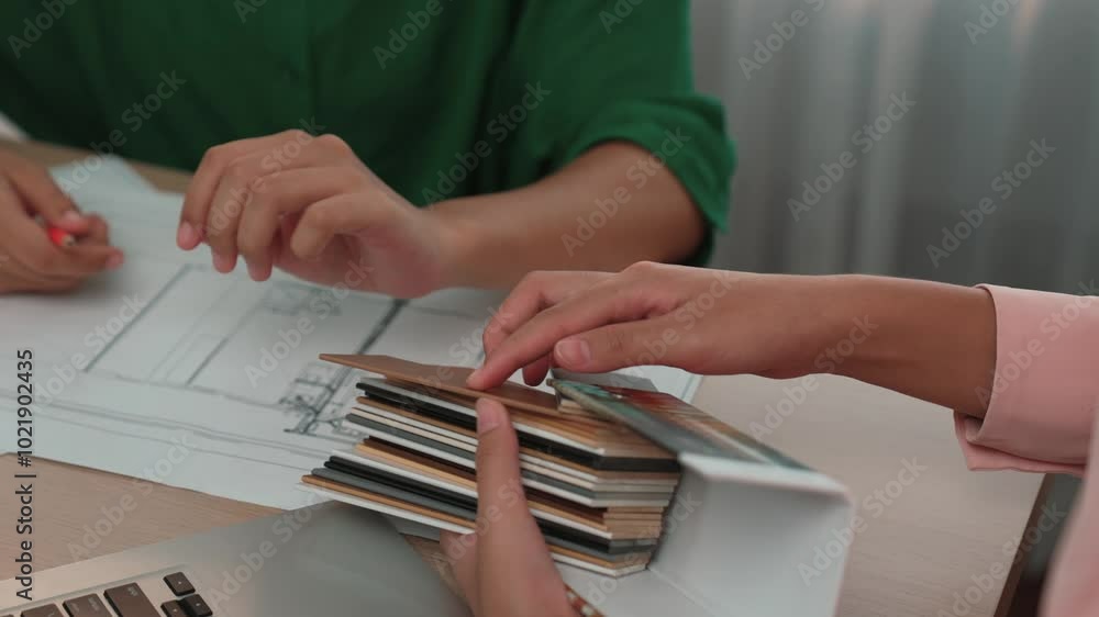 Poster slow motion interior designer using architectural equipment draw a blueprint while interior designer