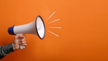 Hand holding A megaphone announces sales and discounts, on a vibrant orange background. Marketing banner