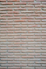 weathered classic red brick wall front view