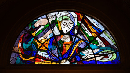 The Virgin Mary. A stained-glass window in the Basilica of Our Lady of the Rosary in Fátima,...