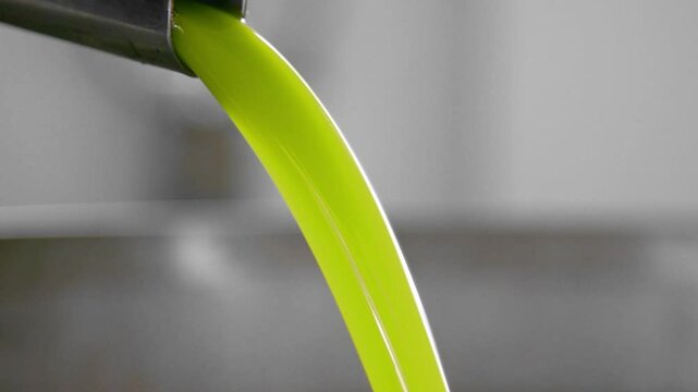 Olive oil production, olive oil comes out of the mill
