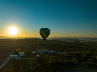 Hot air balloon of many colors flying over the countryside of Laterza, Taranto in Puglia at dawn 64

