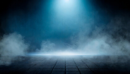 A misty stage illuminated by a blue spotlight in a dimly lit environment during a theatrical performance