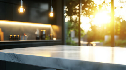 Fototapeta premium A modern kitchen bathed in natural light, featuring a prominent marble bench in the foreground. The background is softly blurred, showcasing chic light fixtures and a calming neutr