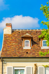 Obraz premium Nice mediterranean house facades roofs and windows with different colours