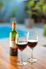 two glasses of wine and bottle