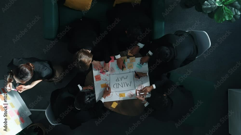 Aufkleber top down aerial view of group of smart diverse business people brainstorm marketing idea while writi