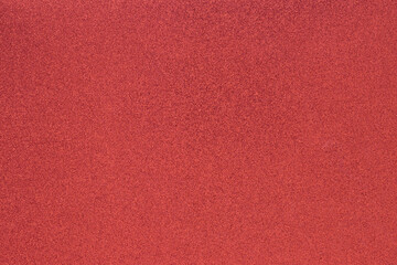 Fototapeta premium Christmas background in red color with glitter