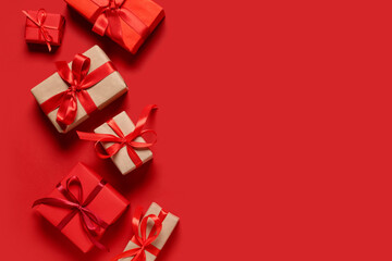 Beautiful Christmas gift boxes on red background