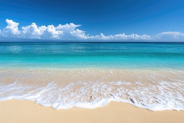 Fototapeta premium Clear blue water and sandy beach. Perfect for vacation, travel, and summer themes.