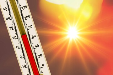 Summer, red heat and a thermometer, sun background