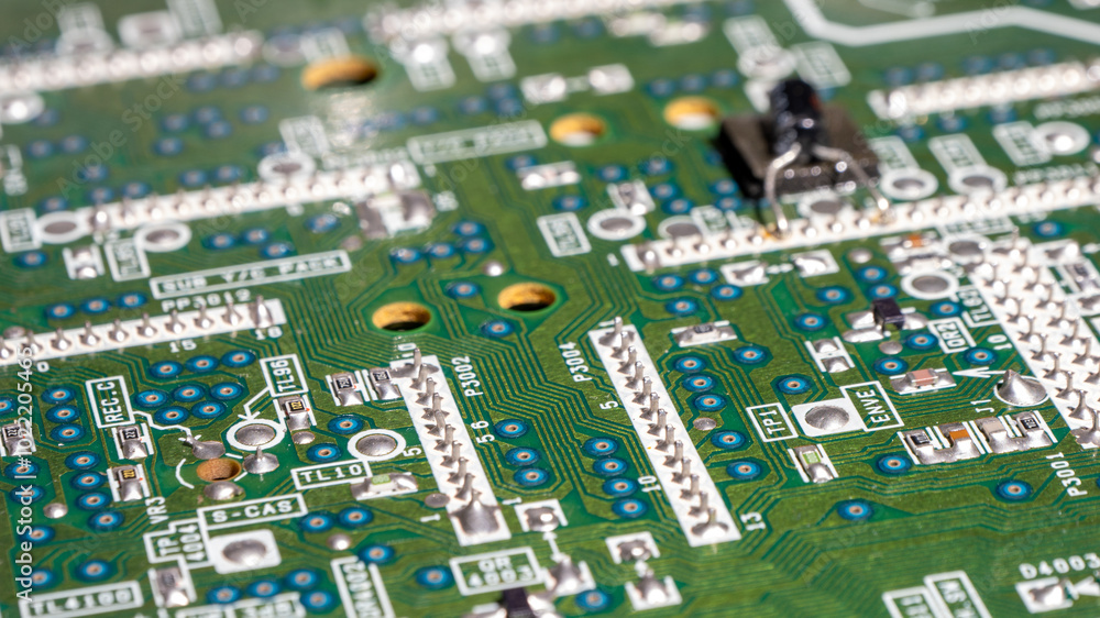 Poster a close up of a circuit board with many small holes