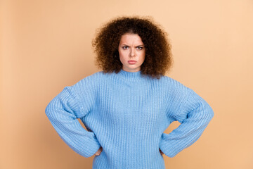Photo portrait of attractive young woman irritated pose dressed stylish blue knitwear clothes...