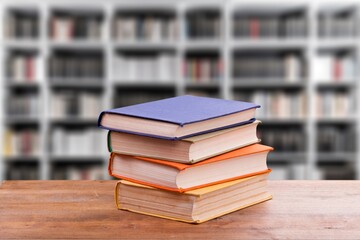 Reading books on shelf in school library