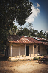 old mud house in the woods in Bangladesh