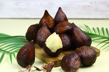Group of Salak or Salacca zalacca one of Indonesian local fruits. Isolated background, selective focus.