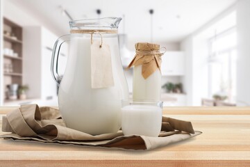 Fresh dairy products on kitchen table
