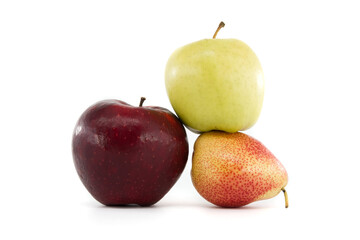 Red apple, green apple, and pear fruit trio on white background