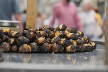 traditional Istanbul street food grilled chestnuts in a row