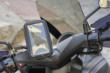 A Fashionable Motorcycle Handlebar that Comes with a Convenient Smartphone Holder for Riders