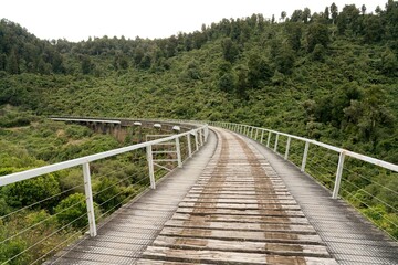 Old Railway Bridge with Removed Tracks - Rustic Industrial Landscape