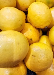 A collection of yellow lemons, suitable for background.