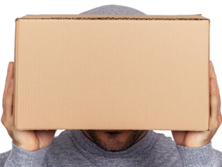 Person carrying large cardboard box for transportation or moving services