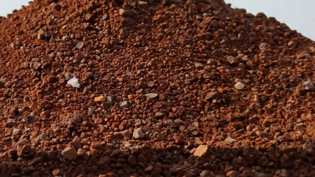 pile of mined bauxite is a sedimentary rock that contains high amounts of aluminum and is the main source of aluminum and gallium in the world, zoom in. 4K
