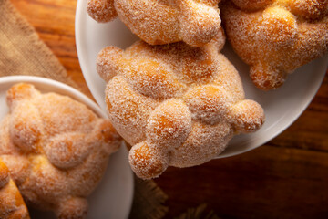 Pan de Muerto. Typical Mexican sweet bread that is consumed in the season of the day of the dead. It is a main element in the altars and offerings in the festivity of the day of the dead.