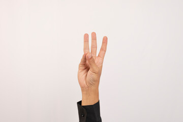 Close-up of Caucasian male hand showing number six gesture isolated on white studio background. Hand number concept for people with disabilities.