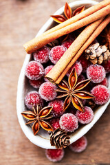 Star anise with cinnamon. Christmas spices on rustic wooden background. Close up.	