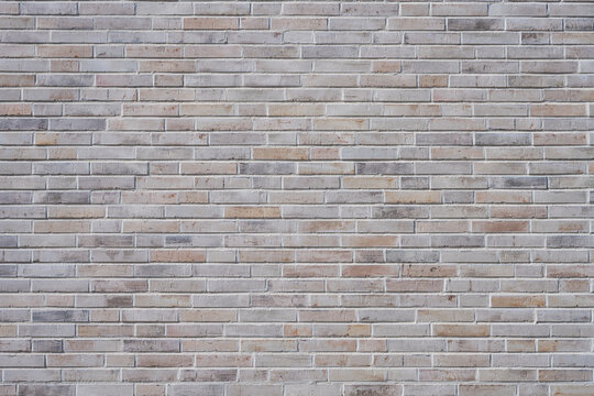 Background from a wall made of light brown clinker bricks