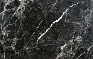 Obraz premium Seamless black marble texture background, top view, ideal for elegant designs and high-end presentations with a luxurious feel.