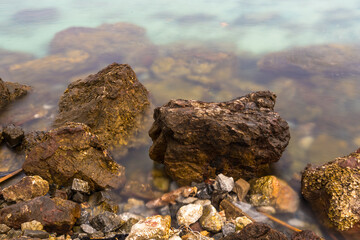 Long exposure photo of Nature’s Harmony: Rocks and Waves in Perfect Balance