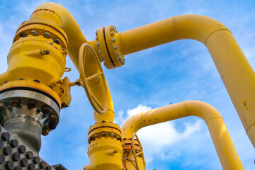 Oil and gas processing plant with pipe line valves.Steel pipelines and valves.Oil pipeline valves in the oil and gas industry.