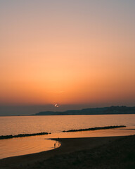 Serene Coastline at Sunset