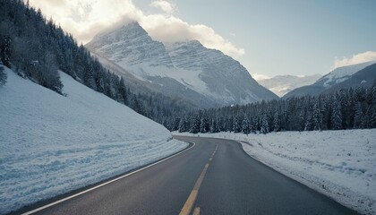 Road by snowcapped mountains against clear sky
7