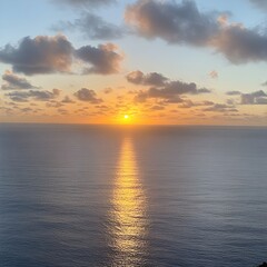 Obraz premium Sunrise Over Calm Ocean Symbolizing New Beginnings