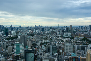 Obraz premium 都市風景 高層ビルから眺める東京のビル群