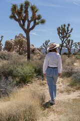 Woman exploring Joshua Tree, National park in California