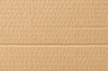Fototapeta premium Brown cardboard sheet abstract background, texture of recycle paper box in old vintage pattern for design art work.
