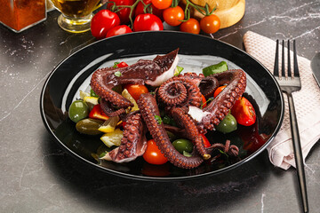 Salad with octopus tentacle and vegetables