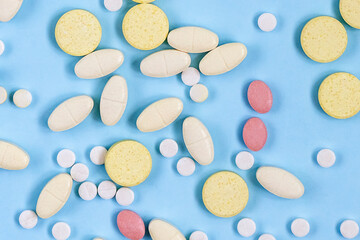 Pharmaceutical Theme with Tablets on Blue Backdrop