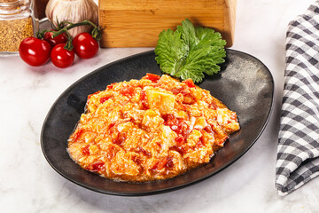 Shakshuka with tomato for breakfast