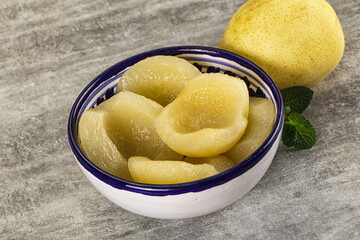 Canned yellow pear with syrup