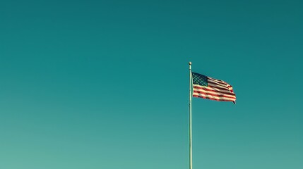 A vibrant representation of the American flag, with patriotic colors flying high against a clear sky, celebrating National Loyalty Day with pride and honor